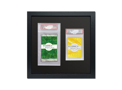 Two framed trading card displays with green and yellow cards inside a black frame.